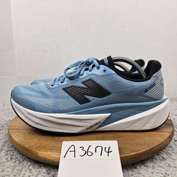 New Balance Mens 11.5D FuelCell Rebel v5 Blue Black Athletic Road Running Shoe - Picture 1 of 12